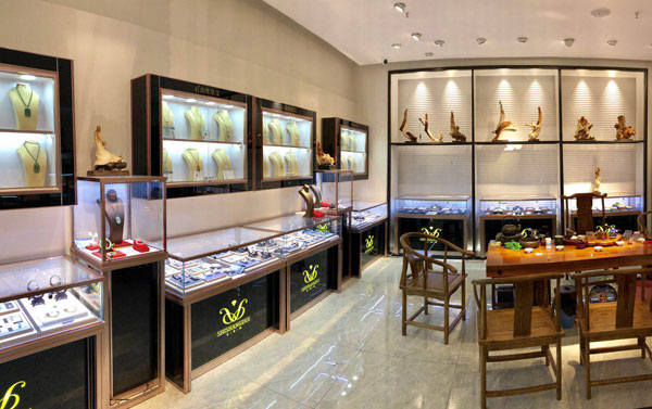 黄金玻璃柜台展示柜是店面销售的重要组成部分